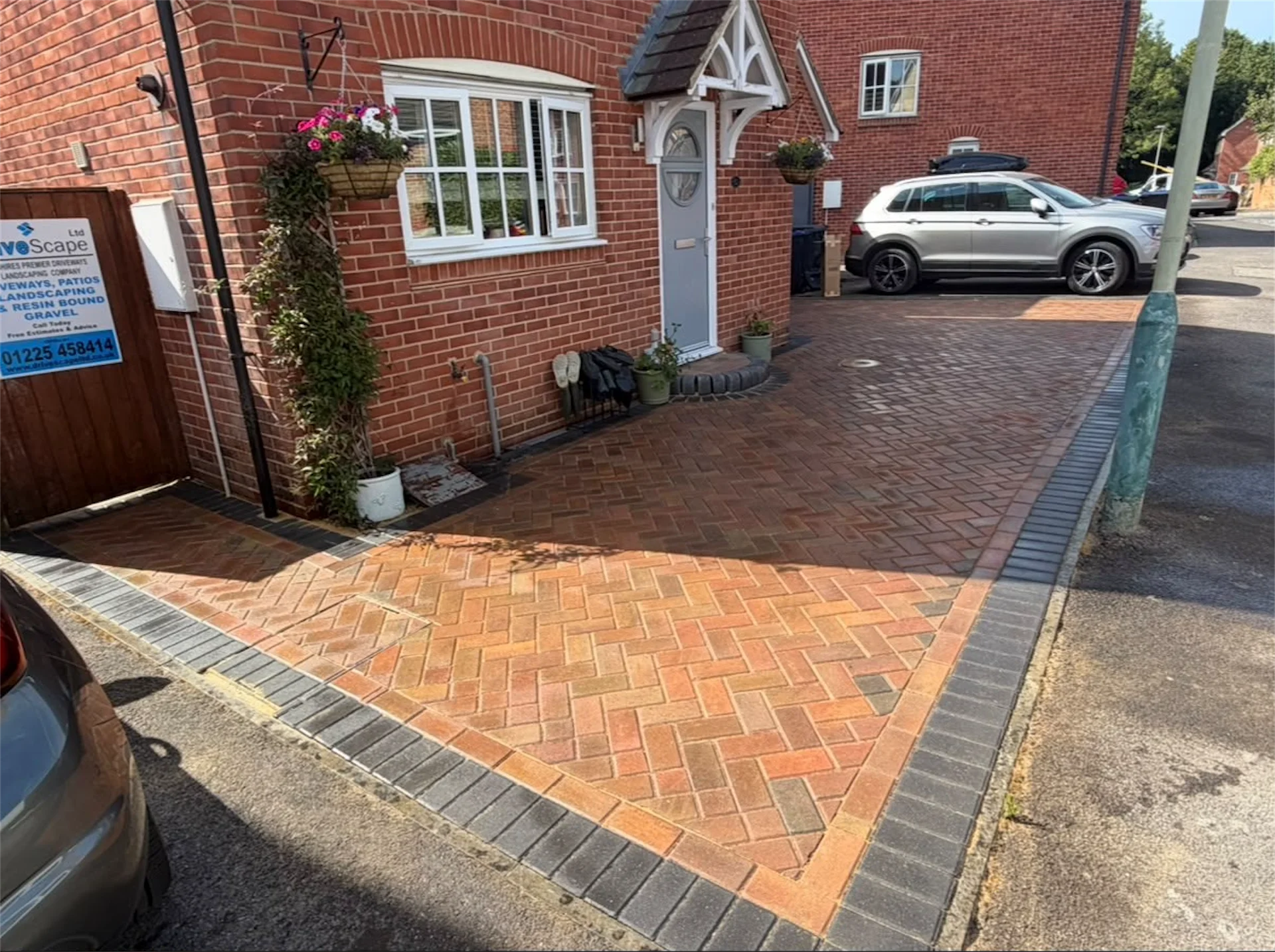 Brindle block paving driveway laid in herringbone pattern with charcoal border, Trowbridge