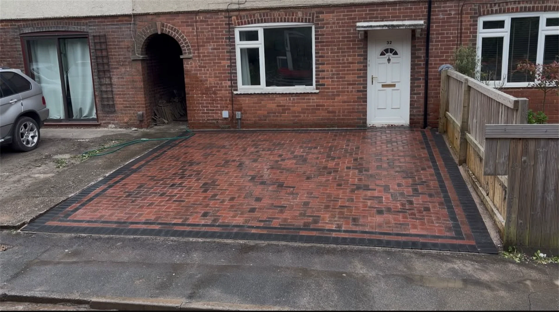 Block paving driveway with brindle and charcoal herringbone pattern and charcoal border, Southwick, Trowbridge