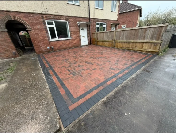Completed block paved driveway laid in 90 degree herringbone pattern with charcoal edging border, Trowbridge